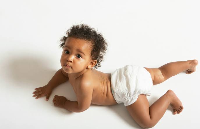 A baby in diapers 